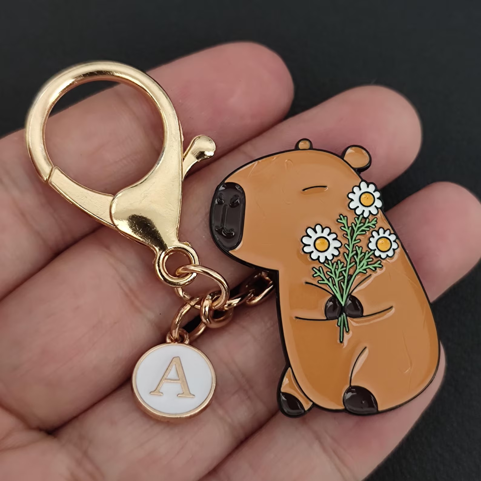 Personalized zinc alloy capybara charm with a custom name, usable as a bag charm or pin badge