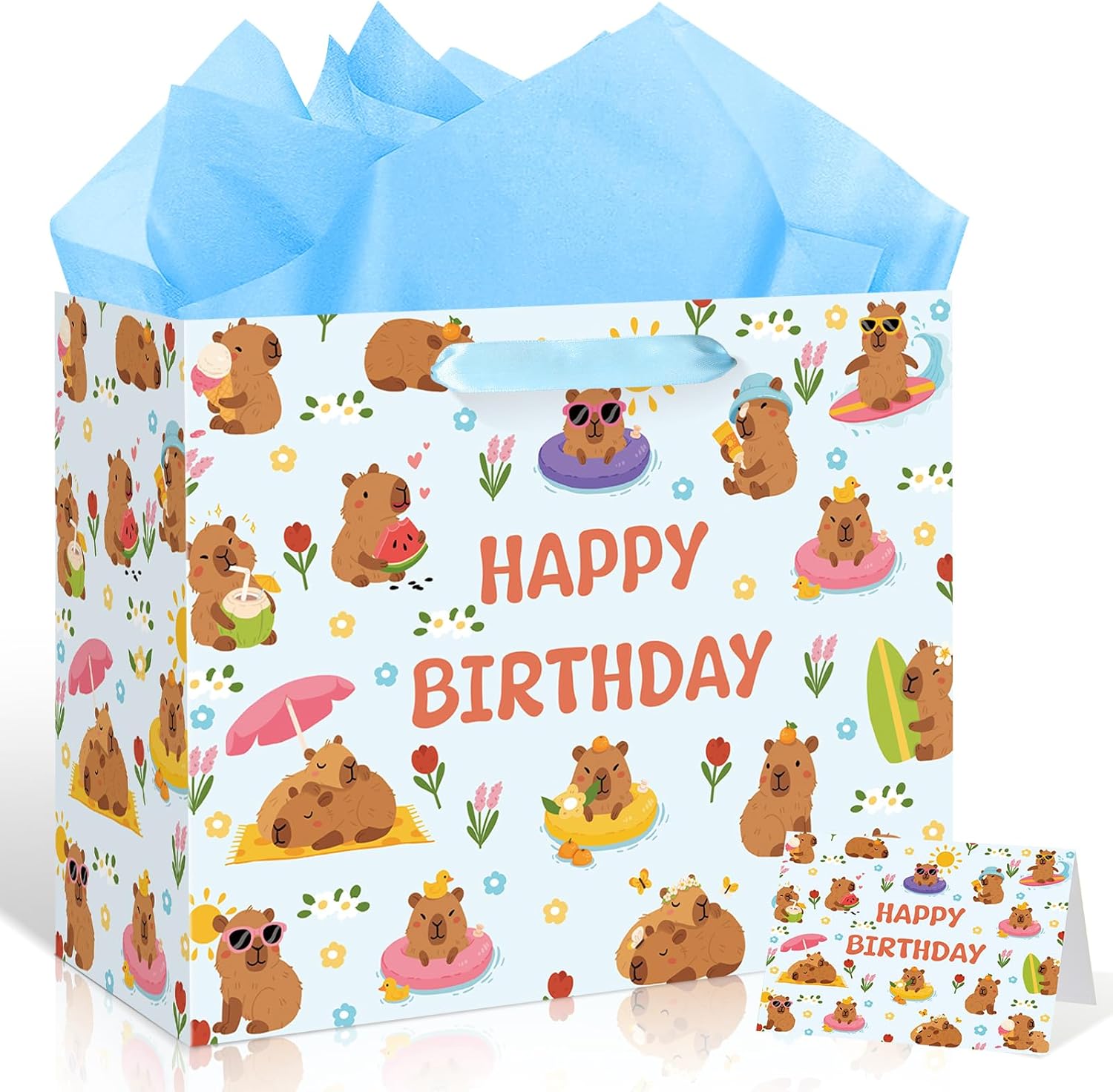 Large full-print capybara gift bag with blue tissue paper and small greeting card