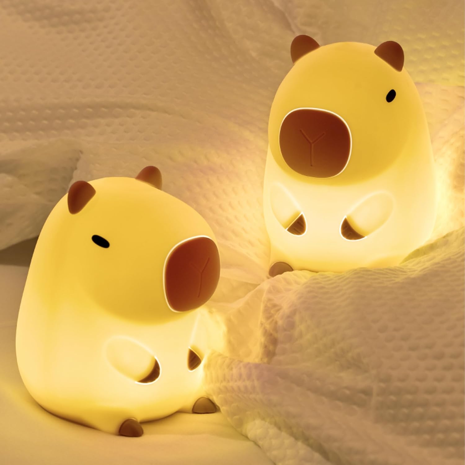 Soft silicone capybara-shaped night lamp with a warm glow